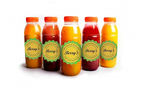 Fruit shake with forest fruit and fresh orange juice