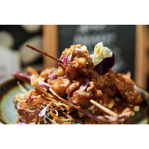 Chicken thigh satay skewers