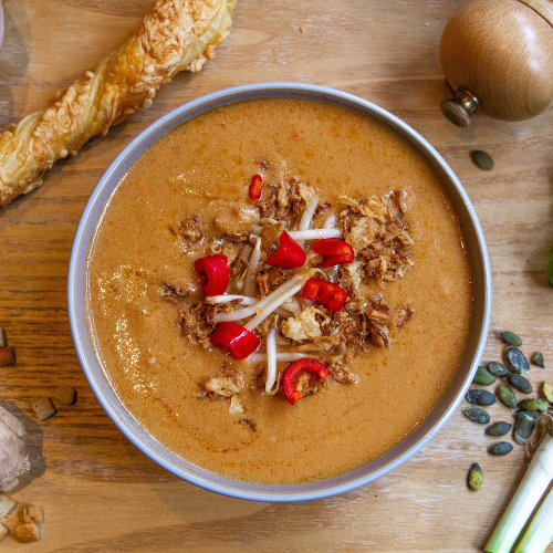 Indonesian peanut soup with fried onions and bean sprouts (vegan