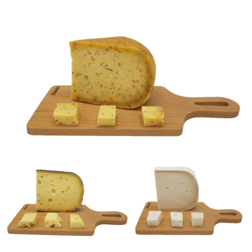 Pieces of cheese freshly cut from the knife