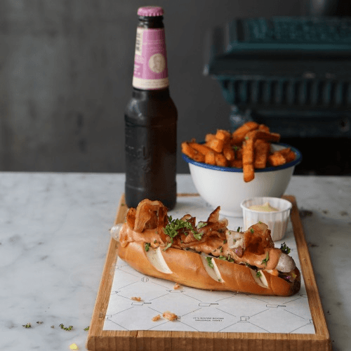 The bourbon bacon dog met Vedett Blond