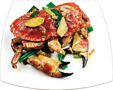 Stir fried fresh crab with ginger and spring onions