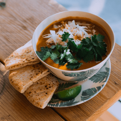 Soup from sweet potato, red lentil and coconut