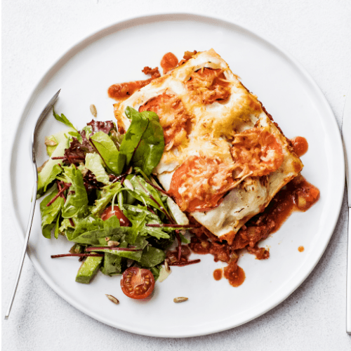 Lasagna bolognese with green salad