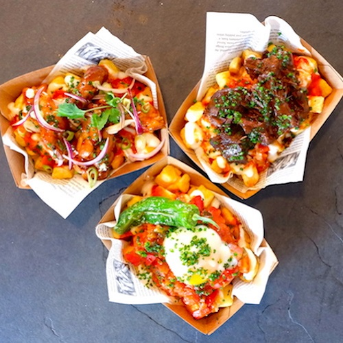 Pisto with poached egg and patatas bravas