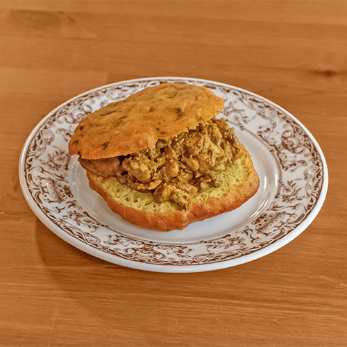 Stuffed bara with chicken curry