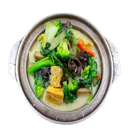 Vegan vegetables mix with tofu and vermicelli with broth