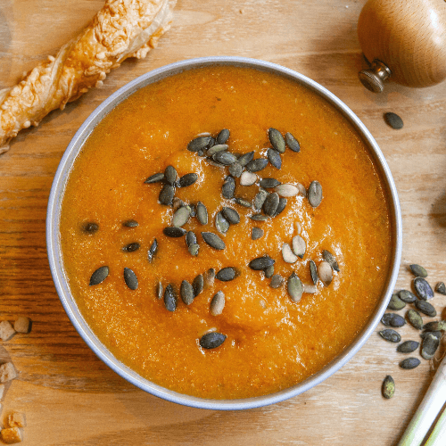 Pumpkin sweet potato soup with pumpkin seeds