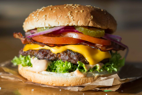 Cheese and lamb bacon burger