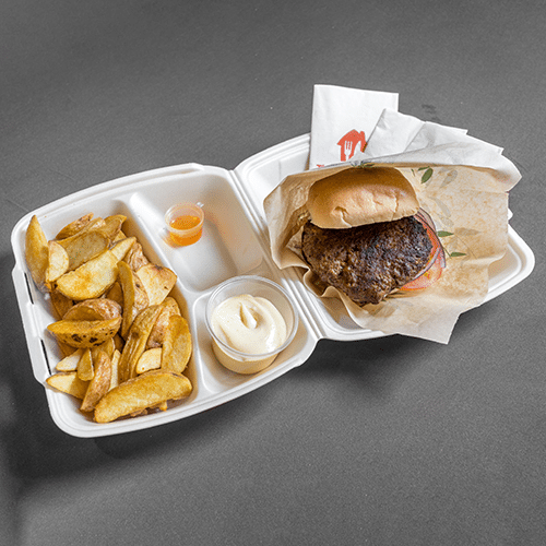 Piri piri burger on a bun with wedges