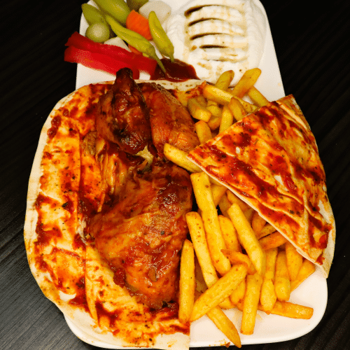 Halve gegrilde kip van het spit