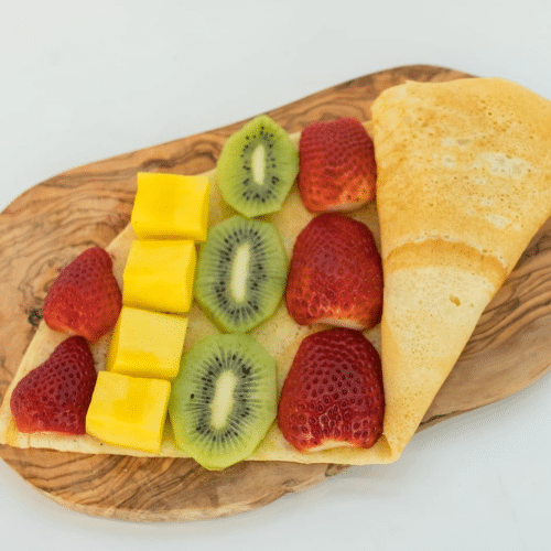 Pannenkoek nutella, aardbei, kiwi en mango