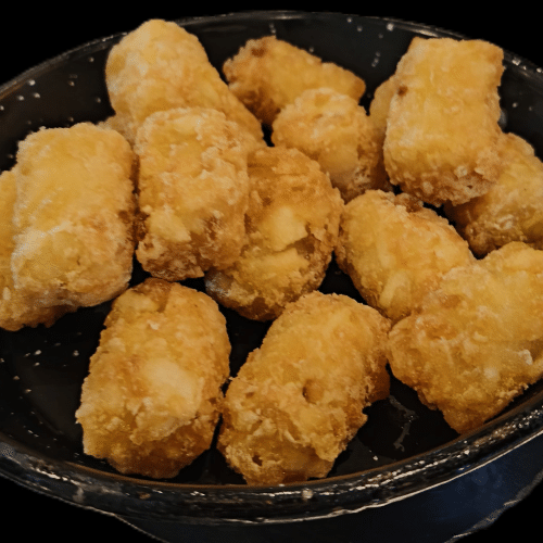Tater tots met truffel mayonaise en Parmezaanse kaas