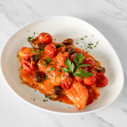 Filetti di spigola in rosso
