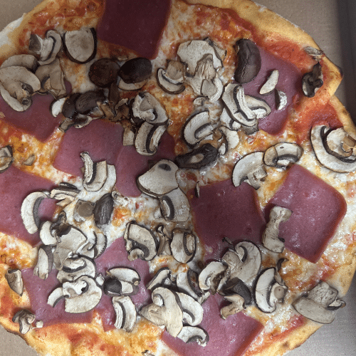 Pizza prosciutto funghi