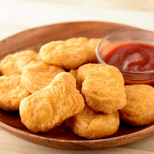 10 halal kipnuggets met chilisaus en mayonaise
