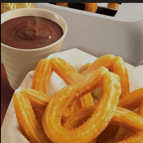 Churros met chocolade en suiker