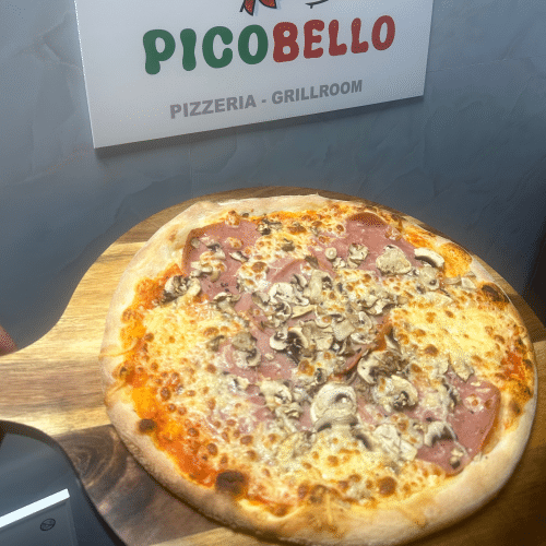 Pizza funghi prosciutto