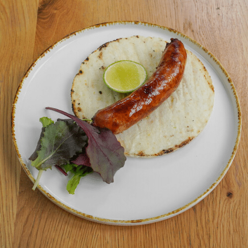 Chorizo con arepa
