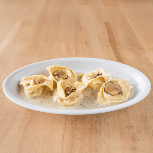 Ravioli tartufati con crema di parmigiano e tartufo