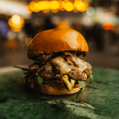 Duck burger cheddar