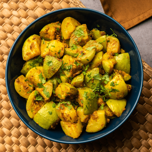 Aloo ghobi met raita salade