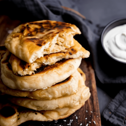 Peshwari naan met raita salade