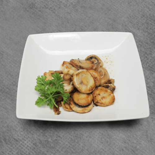Gebakken champignons in kruidenboter