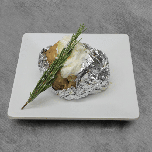 Gepofte aardappel met crème fraîche