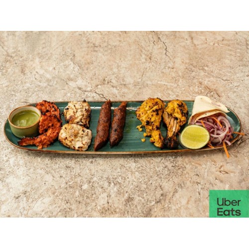 TANDOORI SAMPLER (2 LASHOONI PRAWNS,2 MURGH MALAI KEBAB,2 LAMB CHOPS,2 HARIYALI KEBAB)
