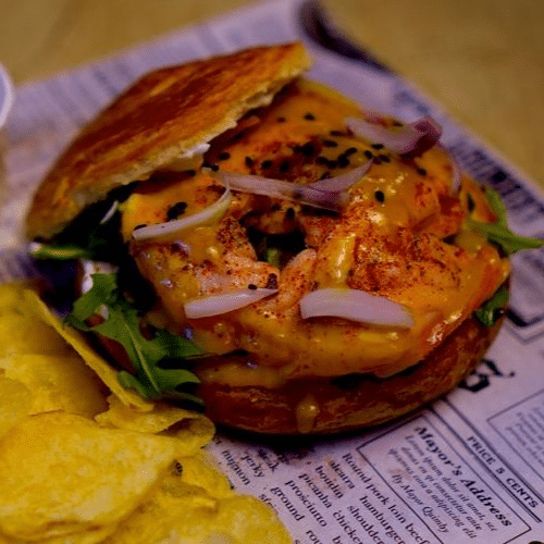 Chicken avocado croissant burger